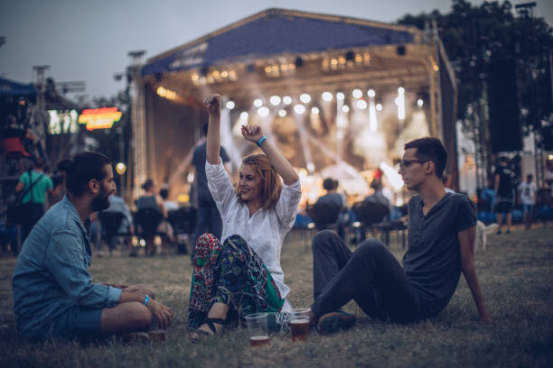 istock Cheerful crowd at music festival 877125280