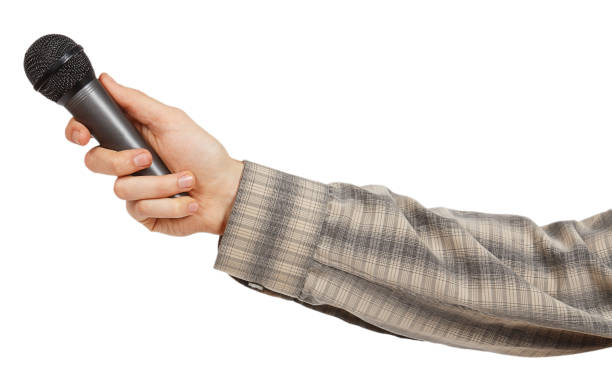 istock Man's hand in a gray striped shirt holding 877133160