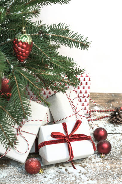 istock Christmas holiday background. Gifts under christmas tree. 877135852