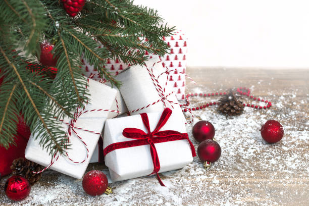 istock Christmas holiday background. Gifts under christmas tree. Copy space. 877135862
