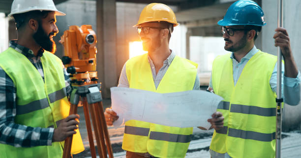 istock Portrait of construction engineers working on building site 877137208