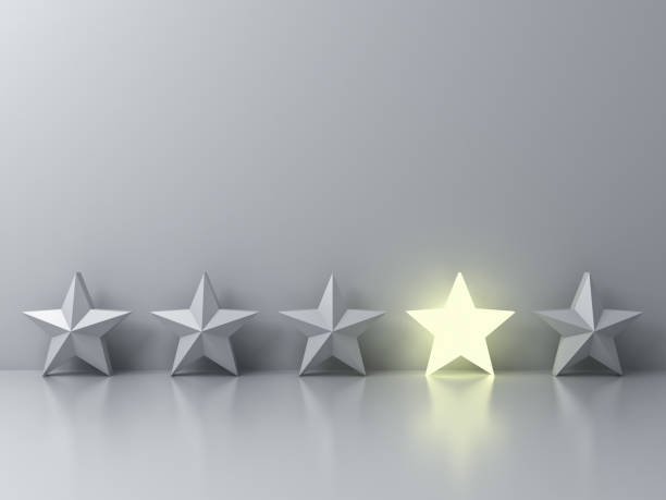 istock Stand out from the crowd and different creative idea concepts , One glowing star standing among other dim stars on grey background with reflections and shadows . 3D render 877137556