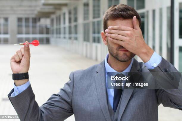 Blind Businessman Holding A Dart Stock Photo - Download Image Now - Ignorance, Blindfold, Failure