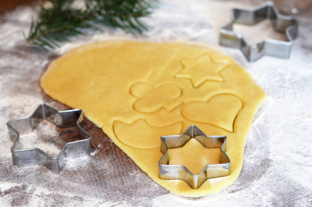 istock Christmas cookie cutters and cookie dough 877153702
