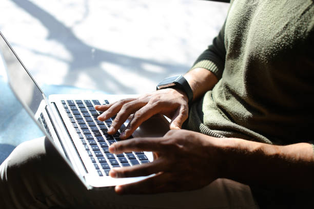 istock PR manager browsing new summaries on laptop 877168648
