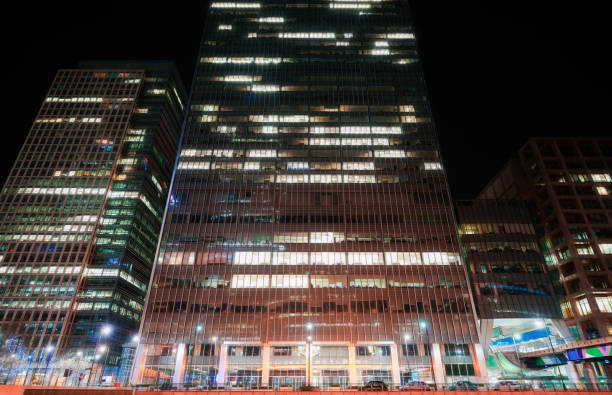 istock Illuminated buildings at London's Canary Wharf 877178112