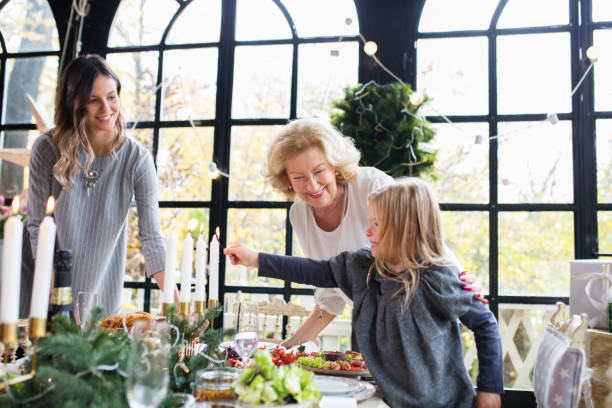 istock Family enjoying preparing Christmas 877178158