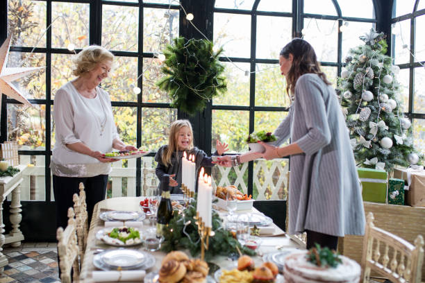 istock Family enjoying preparing Christmas 877180670