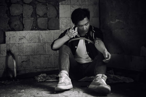 istock A young man takes drugs 877180896