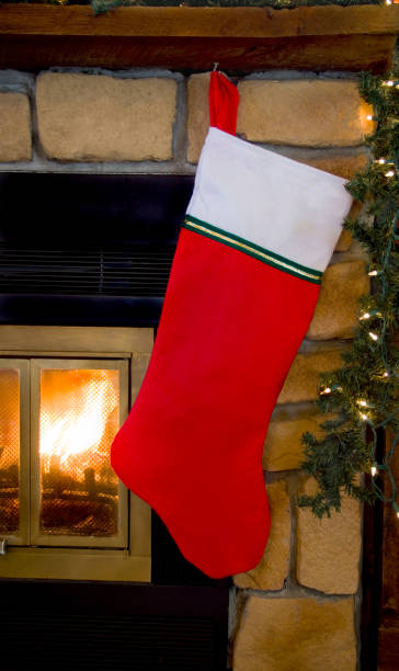 istock Christmas Red Stocking Hanging on Fireplace 877181324