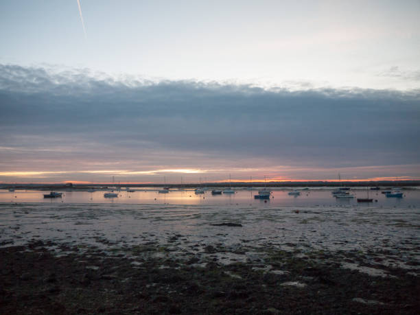 istock empty landscape wooden path walkway west mersea pontoon jetty 877184118