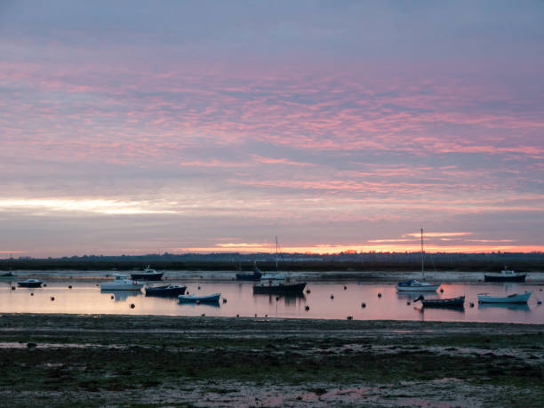 istock empty landscape wooden path walkway west mersea pontoon jetty 877184132