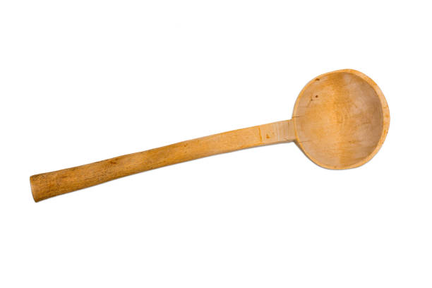 istock Old wooden cooking spoon on isolated on white background 877184372