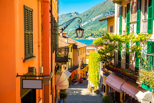 Hillside houses on Lake Como, Lombardy, Italy.  In the foreground is the gardens at Torno and Carate Urio is in the background.