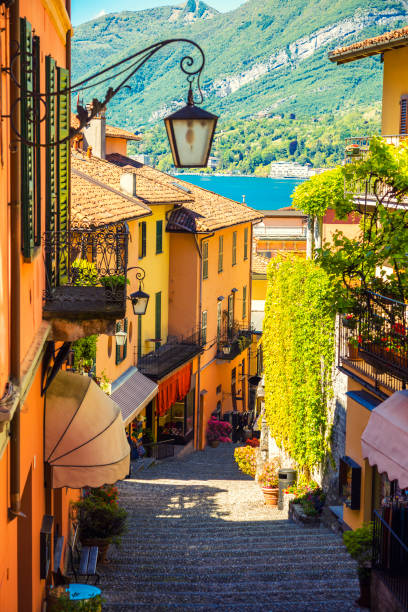 Charming narrow streets of Bellagio with flowers and old buildings