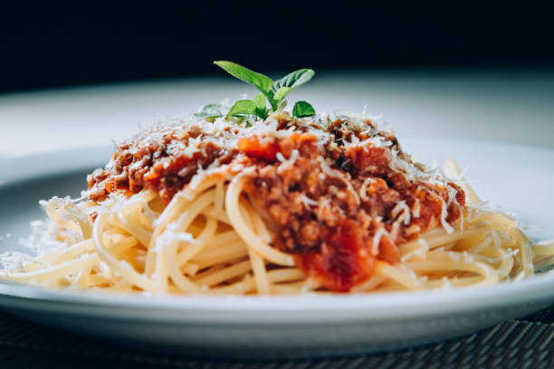 istock Bolognese sauce pasta 877194630
