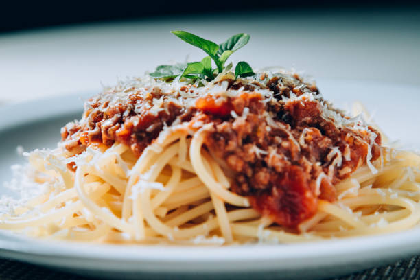istock Bolognese sauce pasta 877194702