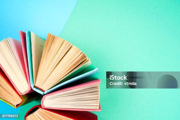 Top View Of Bright Colorful Hardback Books In A Circle Stock Photo - Download Image Now