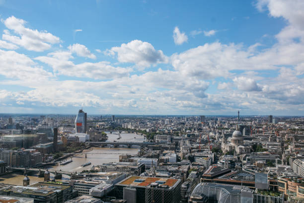 istock Panoramic image of London under the cloudy sky 877202404