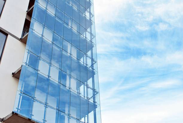 istock Modern apartment buildings on a sunny day with a blue sky. 877208600