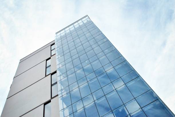 istock Modern apartment buildings on a sunny day with a blue sky. 877208626