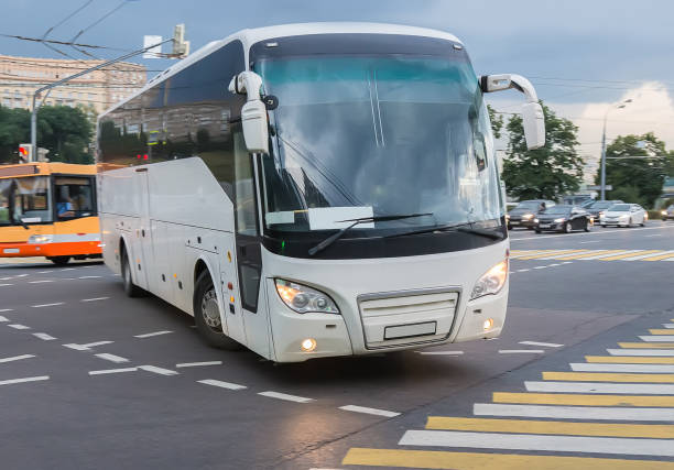 istock bus at the city intersectio 877208694