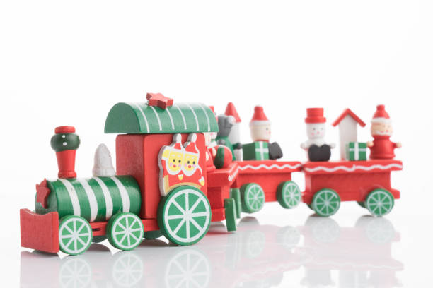 istock wooden toy train with colorful blocs isolated 877212212