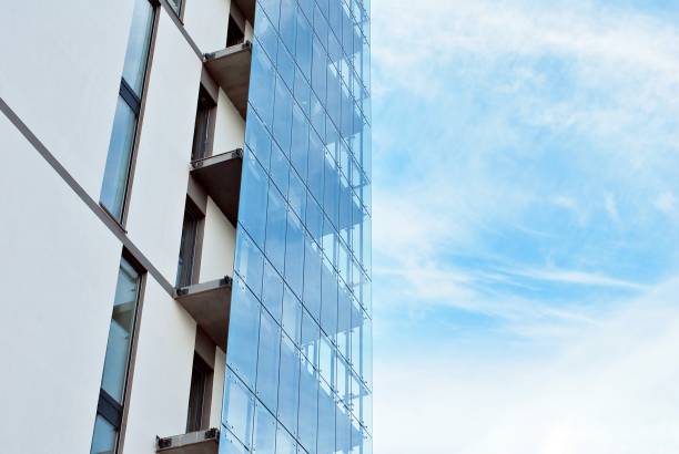 istock Modern apartment buildings on a sunny day with a blue sky. 877212710