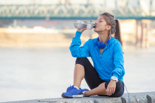 istock Fitness girl relaxing 877228050