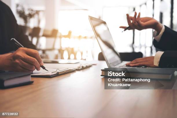 Two Businessmen At Work Business Crew Working With New Startup Financial Project Planman And Woman Discussion Information With Laptop And Digital Tablet In A Modern Business Loungeselective Focus Stock Photo - Download Image Now