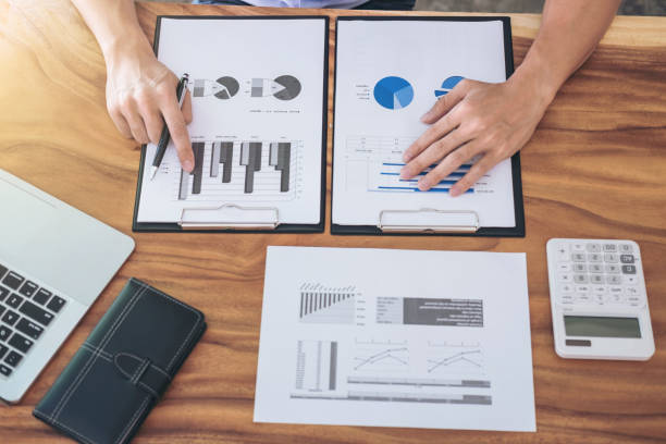 istock Elegant Business man working new business strategy plan in office with document data and report, professional occupation concept 877228138