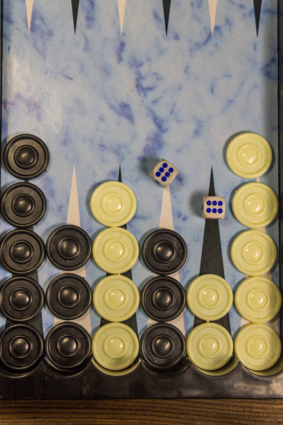 istock Game field in a backgammon with dice and checkers 877231498