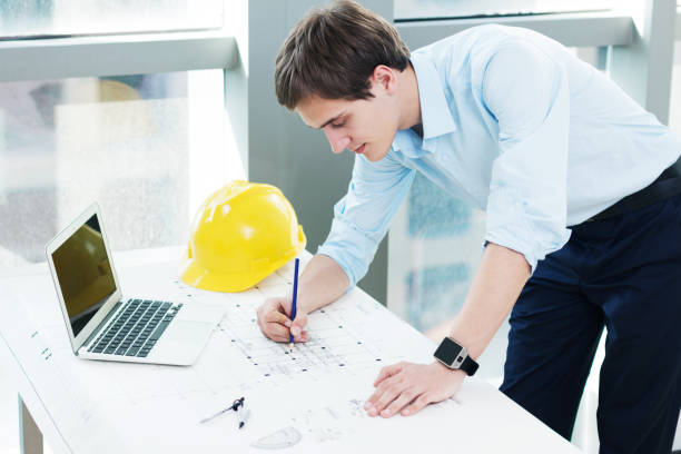 istock young white man technician works in modern office 877232622