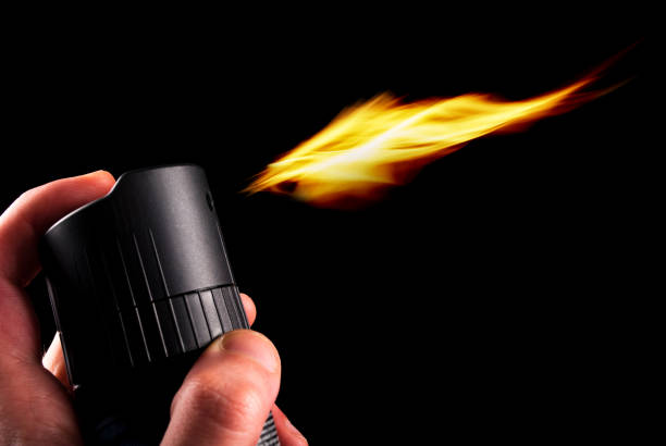 istock Deodorant can and fire blazing out of bottle 877235454