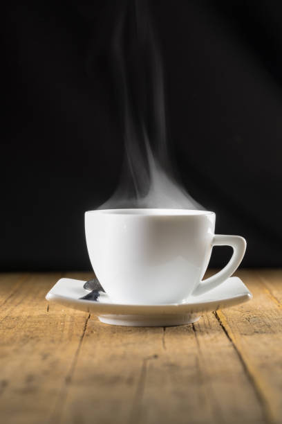 istock Cup of steaming hot coffee 877238328