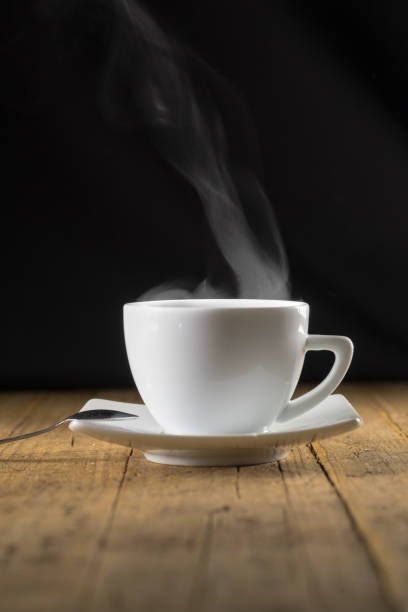 istock Cup of steaming hot coffee 877238332