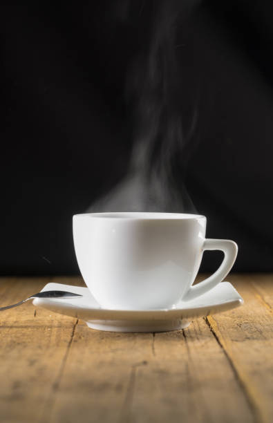 istock Cup of steaming hot coffee 877238336