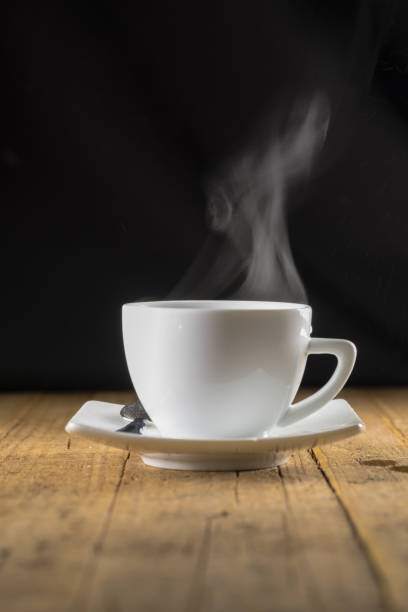 istock Cup of steaming hot coffee 877238338