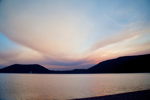 smokey from the local forest fires caused a smokey sunset at East Lake in the Newberry Caldera in Central Oregon