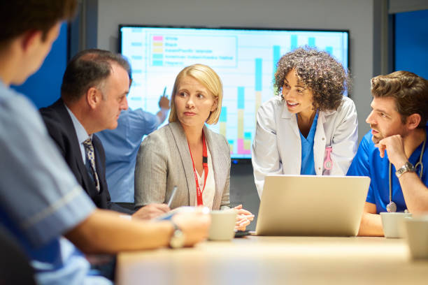 istock hospital team briefing 877244166
