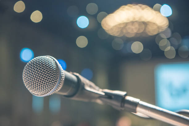 istock Close up Microphone on stage in hotel event 877257102