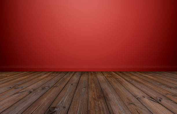 istock Red wall with wood floor, empty room for background 877269360