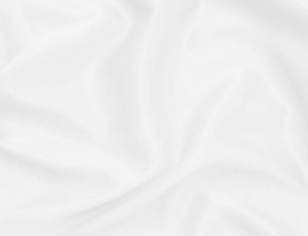 istock White fabric texture for background and design, beautiful pattern of silk or linen. 877269386