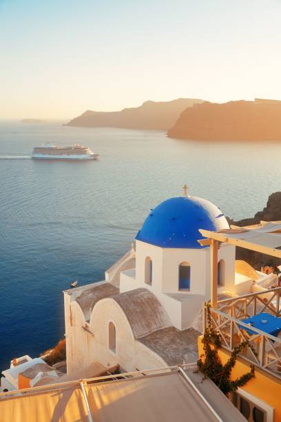 istock Santorini skyline blue church 877270140