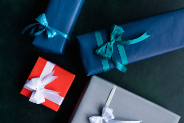 istock family holidays present choice on dark background 877270664