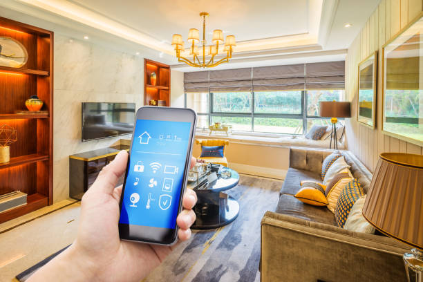 istock smart phone with smart home with modern living room 877271238