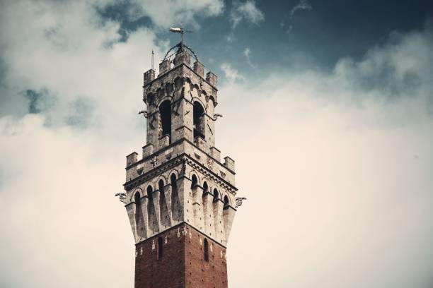 City Hall Bell Tower closeup in Siena Italy.