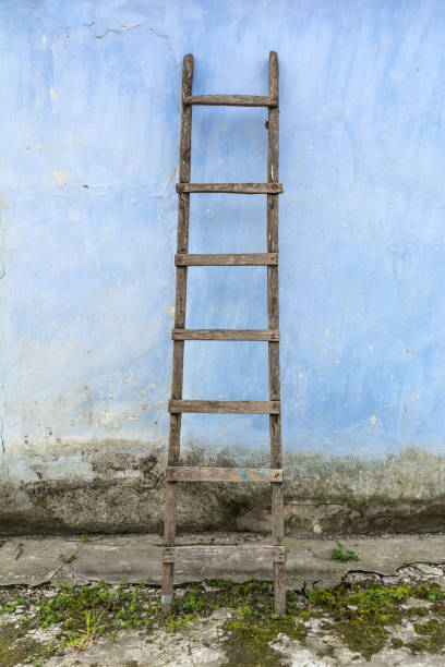 Old wooden ladder in country house