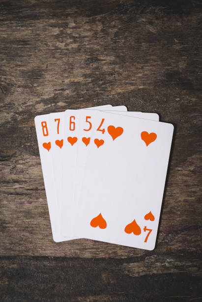 istock playing cards poker straight flush with copyspace 877281120