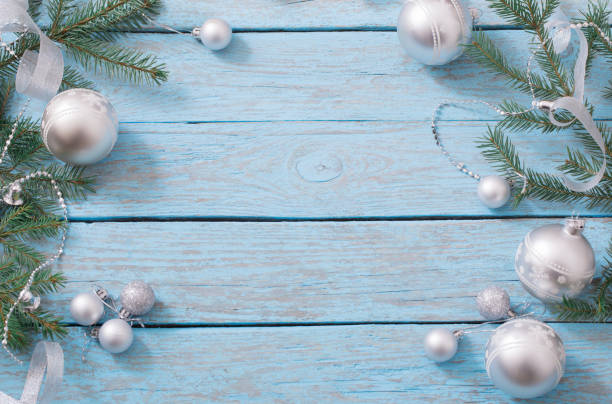 istock Christmas decoration on blue wooden background 877281666